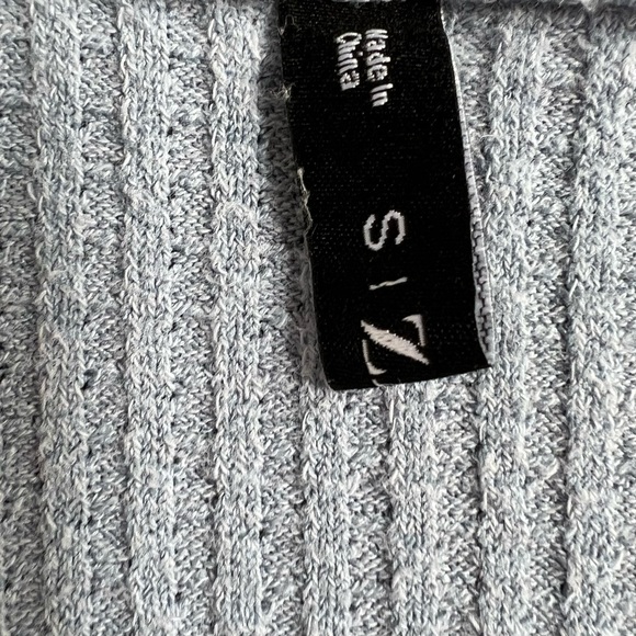 ZAFUL LIGHT BLUE WAFFLE KNIT LONG SLEEVE CROP TOP WITH TIE AND PUFF SLEEVES - Picture 7 of 8